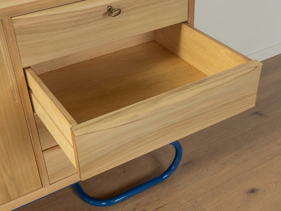 Image 1 of Dressoir uit 1950 met blauwe bauhaus poten