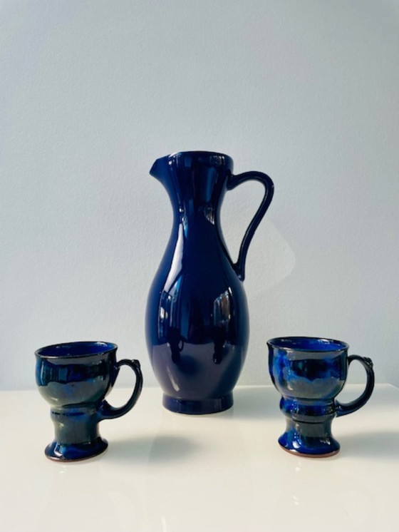 Image 1 of Set in ceramica composita blu cobalto – brocca + 2 calici (firmati)