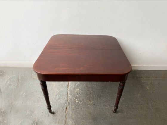 Image 1 of Table de salle à manger victorienne à rallonge en acajou avec pieds tournés et roulettes