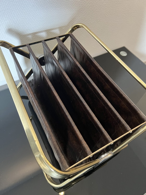 Image 1 of Castelli krantenhouder jaren 60