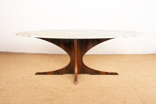 Oval coffee table in Carrara marble and rosewood by Hugues Poignant 1960.