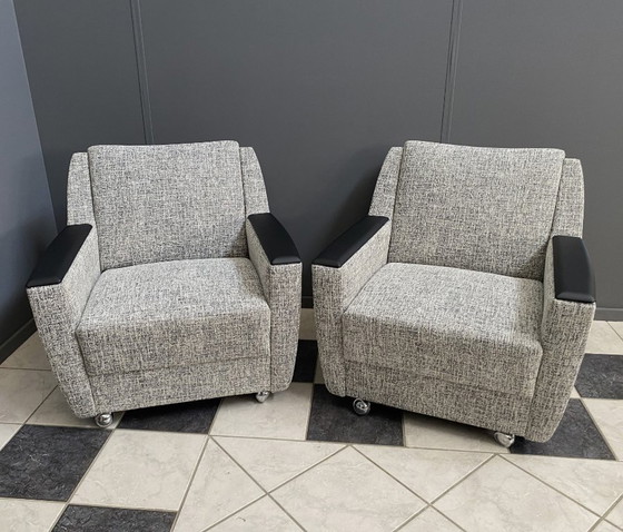 Image 1 of set of 2 grey relax chairs on castors 1970s