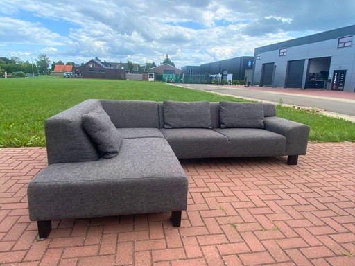 Canapé d'angle moderne en tissu gris