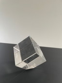 Tilted glass cube with prismatic effect