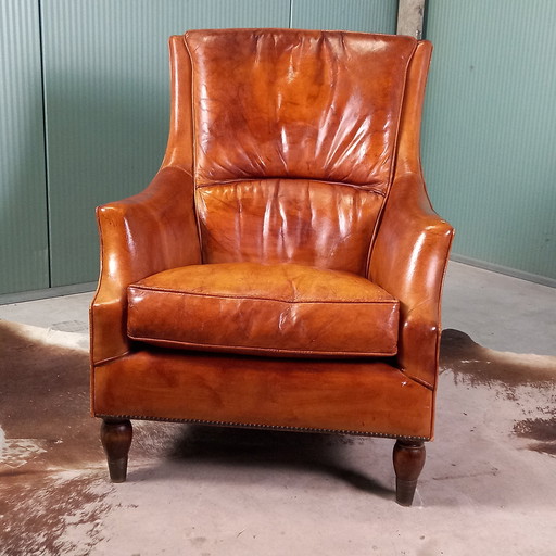 Fauteuil lounge vintage en peau de mouton