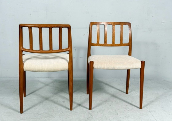 Image 1 of JL Møllers, ensemble de 4 chaises de salle à manger, modèle '83', teck, laine, années 1960, Danemark (4)