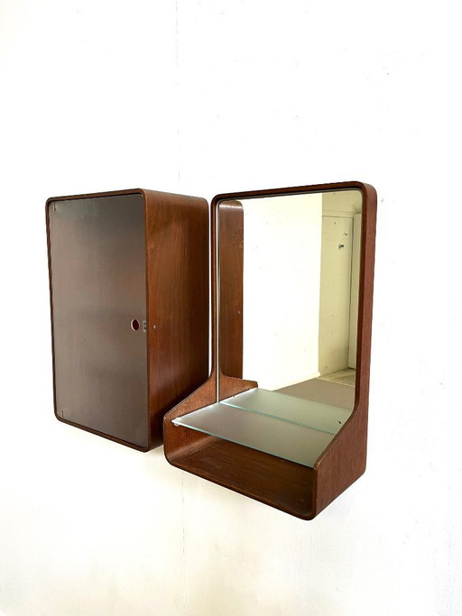 Euroika mirror and medicine cabinet made of teak, designed by Friso Kramer for Auping in 1963.