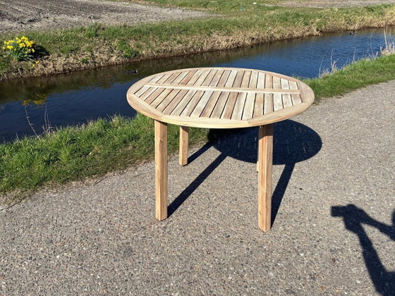Image 1 of Zware kwaliteit teakhouten tuintafel 150cm - als NIEUW -
