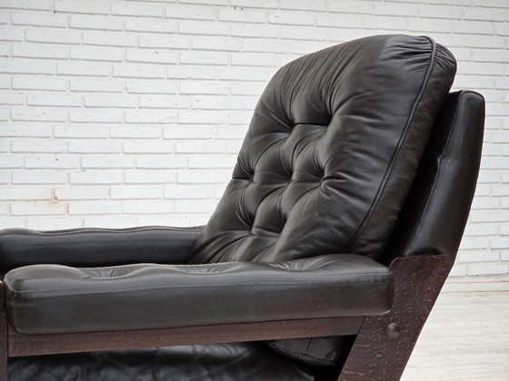 Image 1 of Deense fauteuil uit de jaren 70, bruin meubelleer, eikenhout.