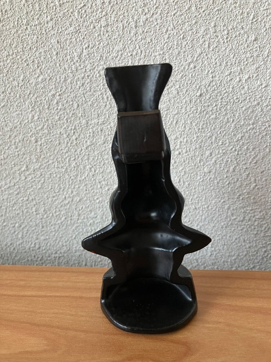 Image 1 of Salvador Dali glasses stand. Familiar design nose with mustache and lips.