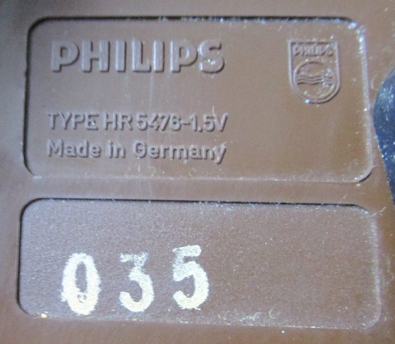 Image 1 of Vintage bruine ronde Philips HR5476 Quartz wandklok uit de jaren 70. 