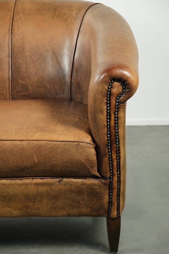 Image 1 of Karaktervolle schapenleren 2 zits bank met een mooie vintage look