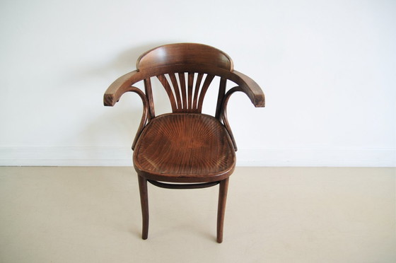 Image 1 of brown wooden bistro chair