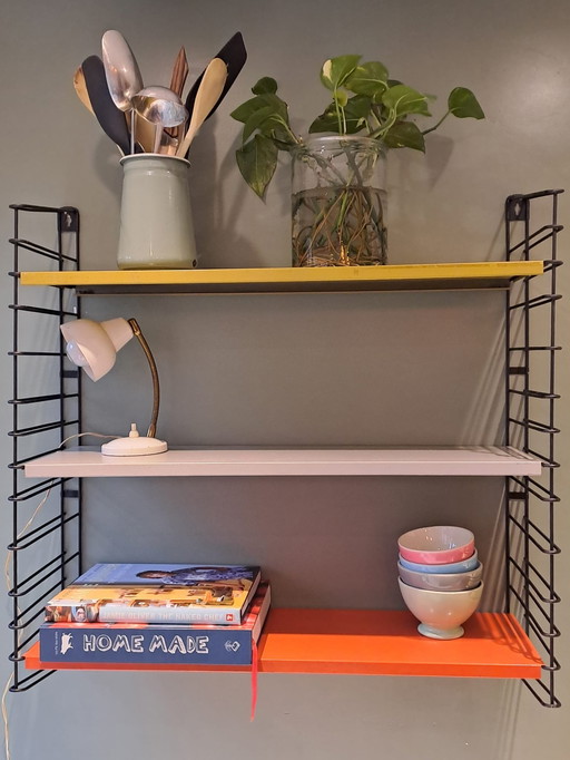 Vintage Tomado wall rack