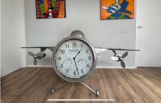 Image 1 of Groot vliegtuig met klok