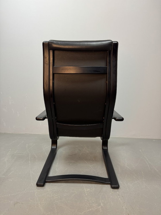 Image 1 of Mid-CenturyDesign Black Leather Lamino Lounge Chair on Black Lacquered Plywood Frame by  Yngve Ekstrom. Denmark, 1970s.