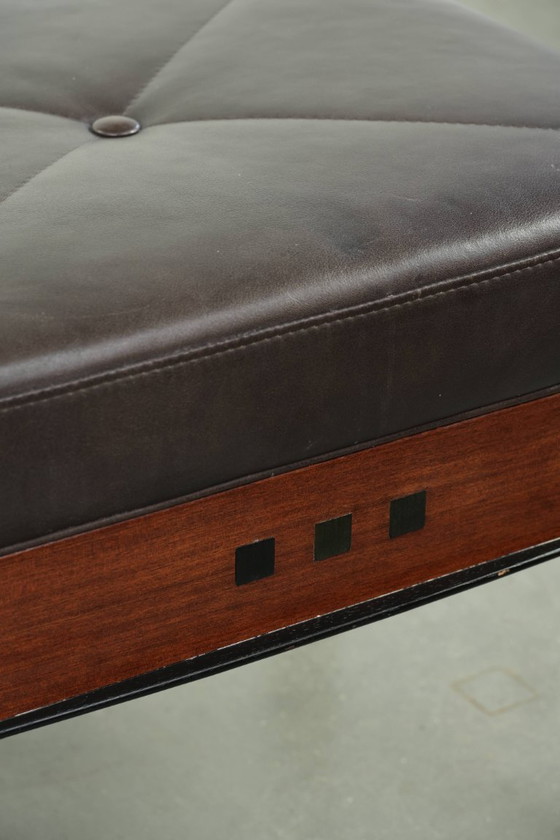 Image 1 of Chocolate brown cowhide Schuitema Art Deco design ottoman/footstool from the Decoforma series