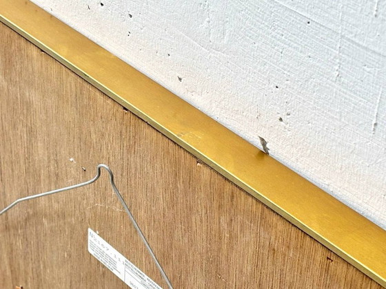 Image 1 of Wall mirror in a frame encased in beveled mirror glass