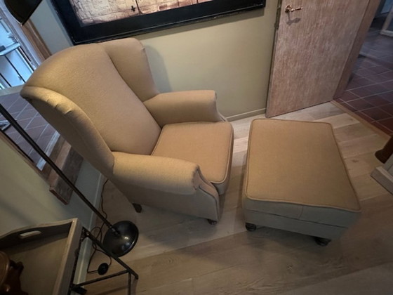 Image 1 of Landelijke fauteuil met poef