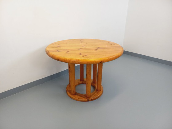 Image 1 of Vintage Scandinavian round dining table by Rainer Daumiller in pine from the 1960s/70s with extensions