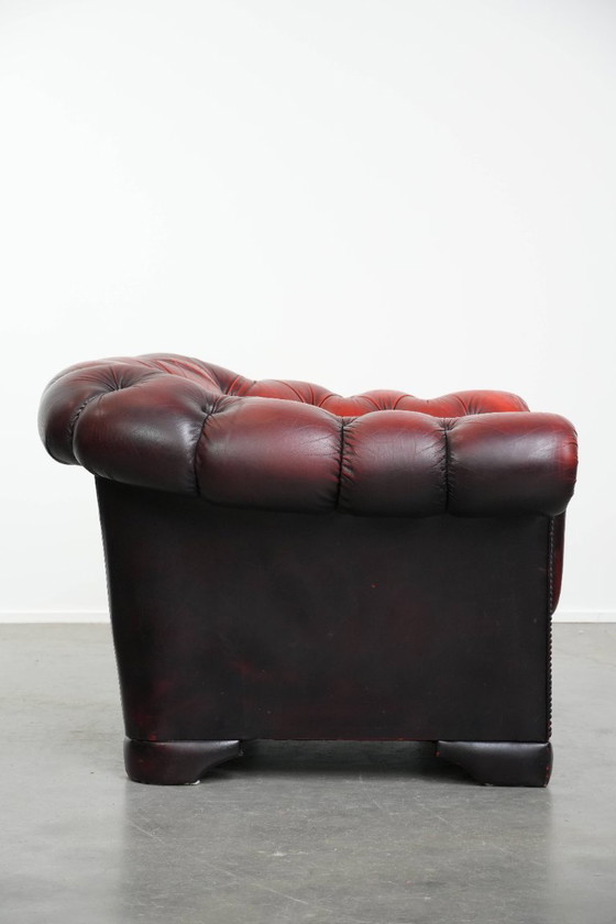 Image 1 of Rode rundleren chesterfield buttonseat fauteuil