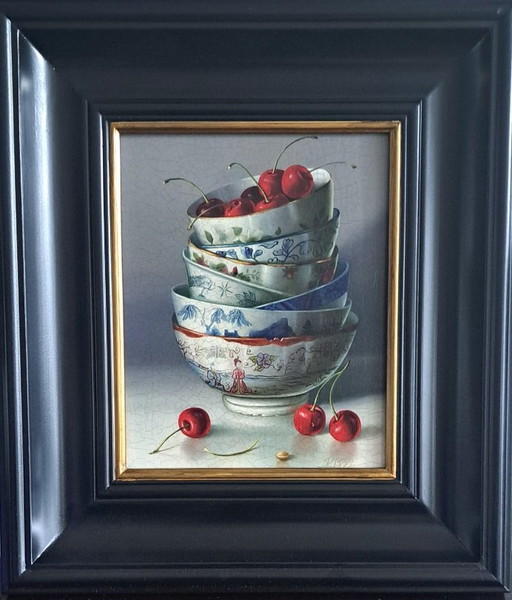 Bodegón con cuencos apilados y cerezas