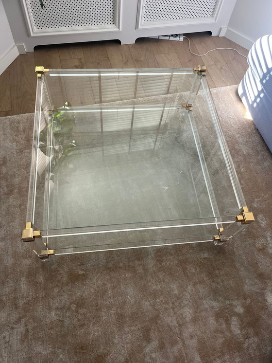 Image 1 of Mid-century glass coffee table with brass accents