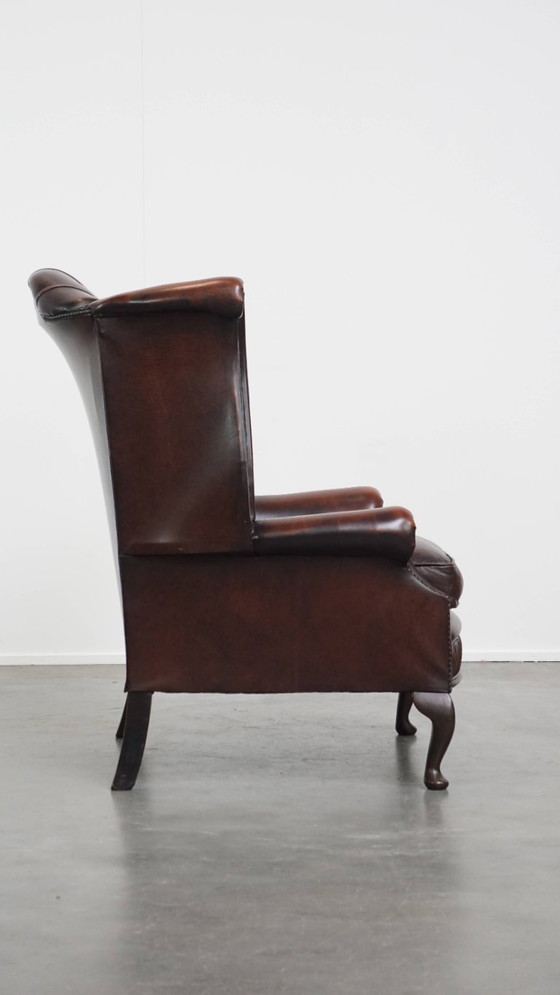 Image 1 of Bruine rundleren chesterfield oorfauteuil