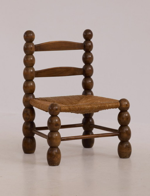 Low chair in solid wood (oak), vintage Dlg Dudouyt, circa 1960