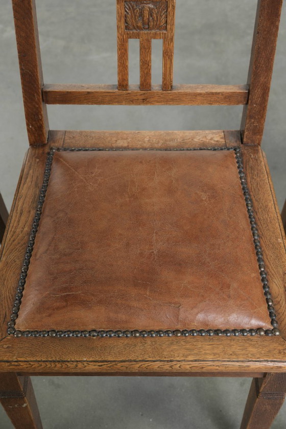 Image 1 of Ensemble de 4 chaises de salle à manger anciennes en chêne de style Art nouveau, recouvertes de peau de mouton.