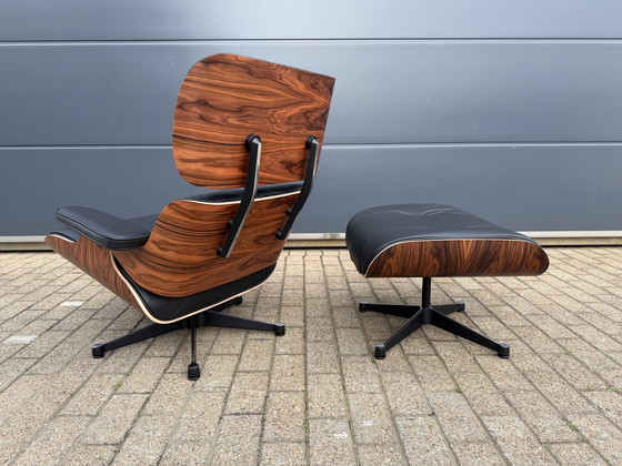 Image 1 of 2 poltrone lounge Vitra Eames XL originali con poggiapiedi, in pregiata pelle nera e palissandro Santos, NUOVE!!