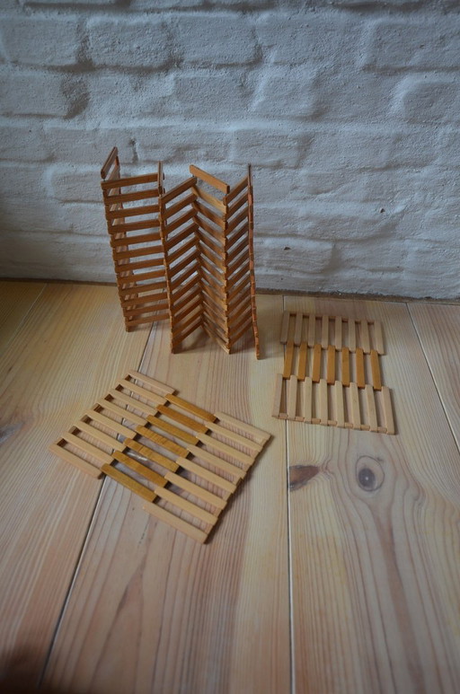 Vintage houten onderzetter, opvouwbaar