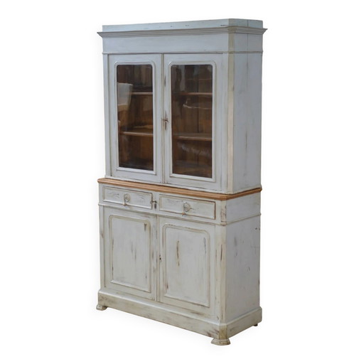 Credenza a due corpi patinata del XIX secolo.