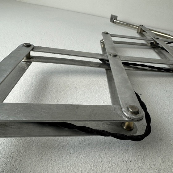 Image 1 of ALTE GROSSE LAMPE INDUSTRIELLE AKKORDEON-WANDLEUCHTE