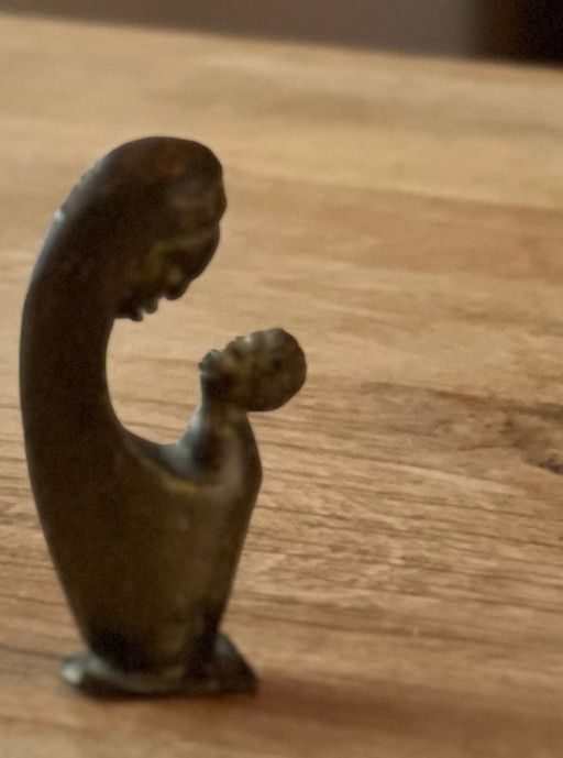 Small brass figurine - mother and child