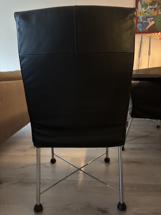 Image 1 of 6 zwarte Montis Chaplin stoelen met rvs onderstel