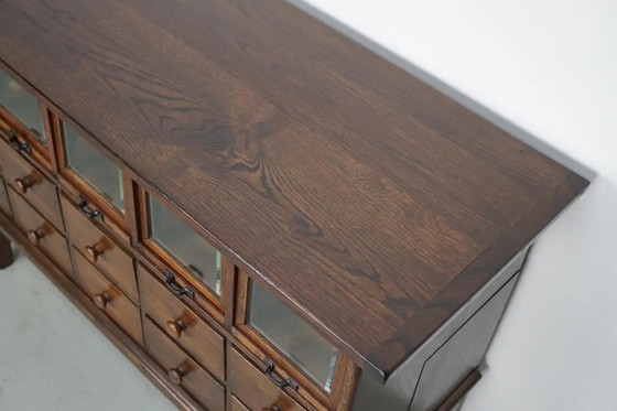 Image 1 of Antiguo armario de mercería alemán de roble, años 20/30