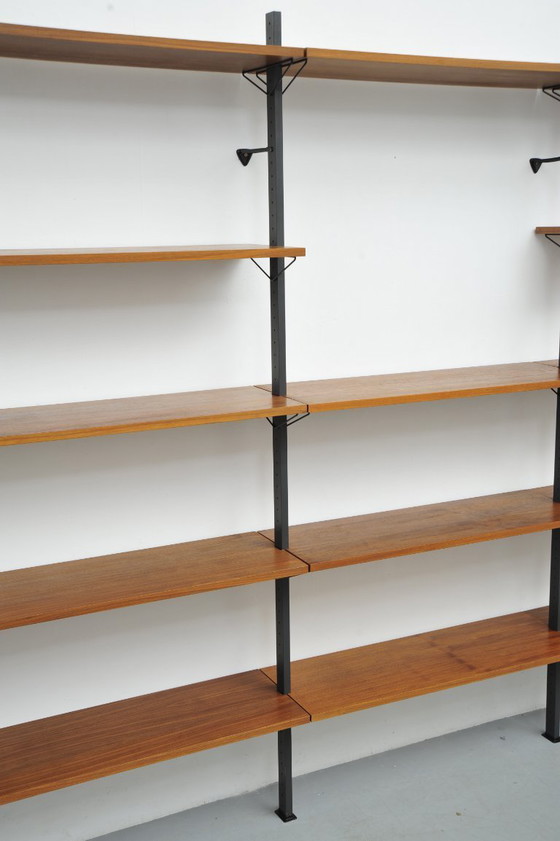 Image 1 of Walnut shelving system by Pira (1960s)