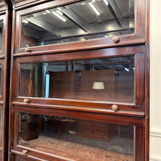 Set of Classic English Globe Wernicke Bookcases – Glass, Wood (photo 14 of 15)