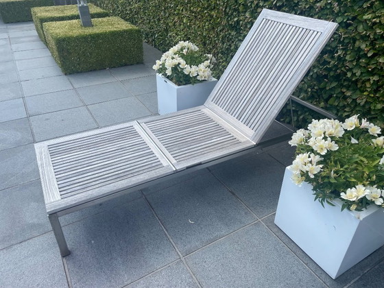 Image 1 of Tavolo da giardino in teak con 6 sedie, gambe in acciaio inox e sdraio che può resistere a qualsiasi tempesta