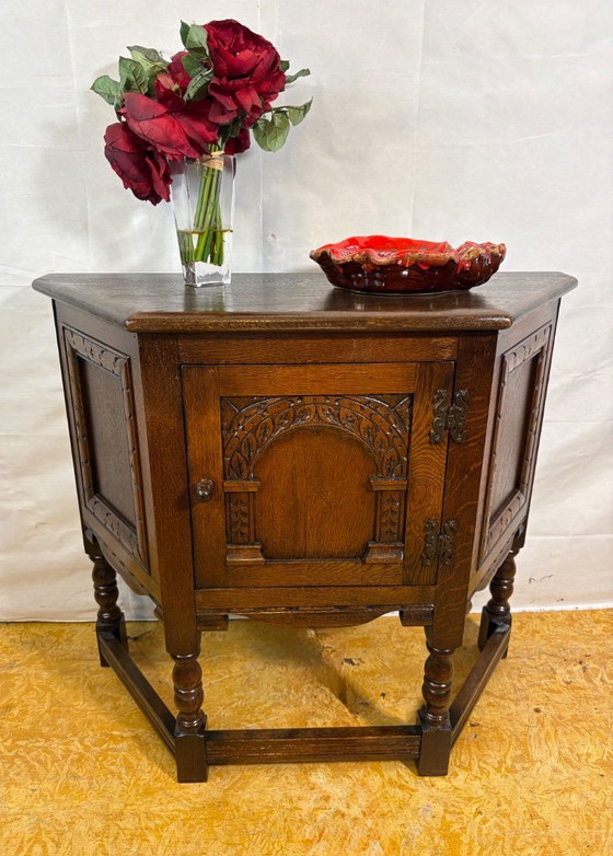 Image 1 of Vintage Old Charm Furniture Canted Side Cabinet by Wood Brothers (Circa 1970)  A charming and beautifully crafted vintage canted