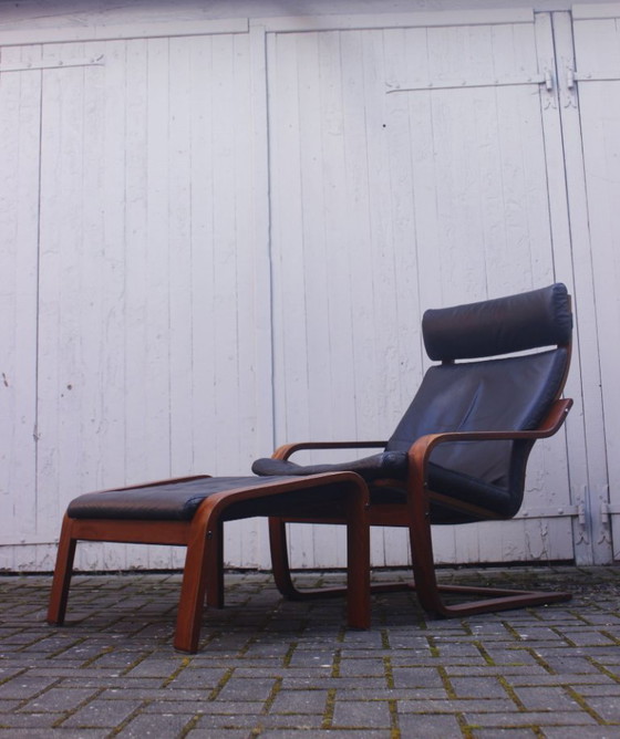 Image 1 of Ikea Vintage - Ikea POÄNG recliner and footstool in black leather, Scandinavian design, 1990s