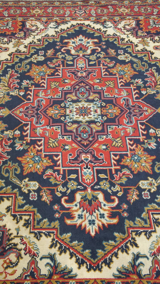 Image 1 of Vintage Vloerkleed Met Rood En Donkerblauwe Kleuren 236x170cm