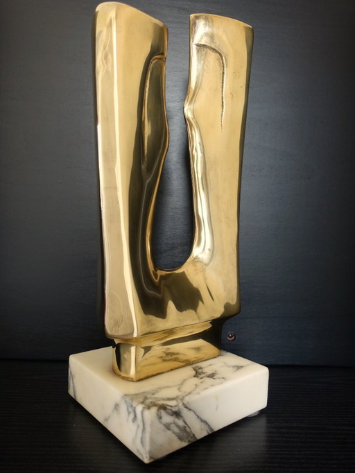 Sculpture en laiton poli d'après Gérard Koch.