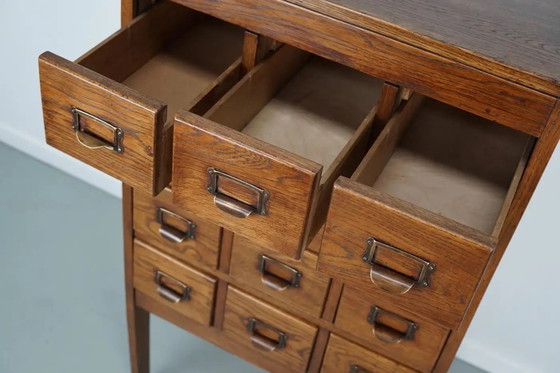 Image 1 of Antieke Nederlandse eiken apothekers- / archiefkast, jaren 1930