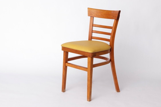 Image 1 of Vintage Beechwood Chair with Yellow Faux Leather Seat – 1960s/1970s German Mid-Century Modern