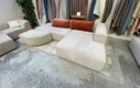 Divano angolare modulare 4x6 in velluto color ruggine + pouf