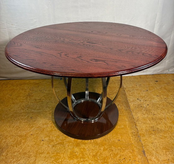 Image 1 of Vintage ronde eettafel in art-decostijl – eikenhouten blad en chromen onderstel – designgeïnspireerd. Breng tijdloze elegantie i
