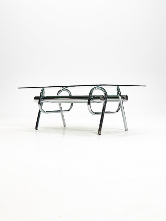Image 1 of Tavolino da caffè scultoreo cromato con nodo degli anni '70