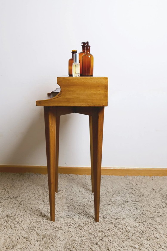 Image 1 of The Silhouette Stand 
